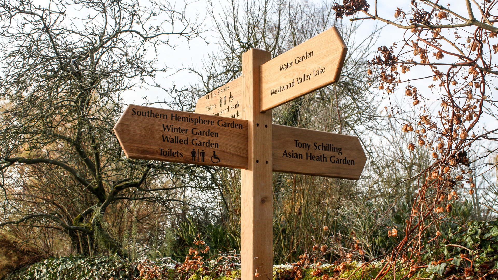 4-Arm Wooden Fingerpost Sign Post with bespoke lettering and symbols.