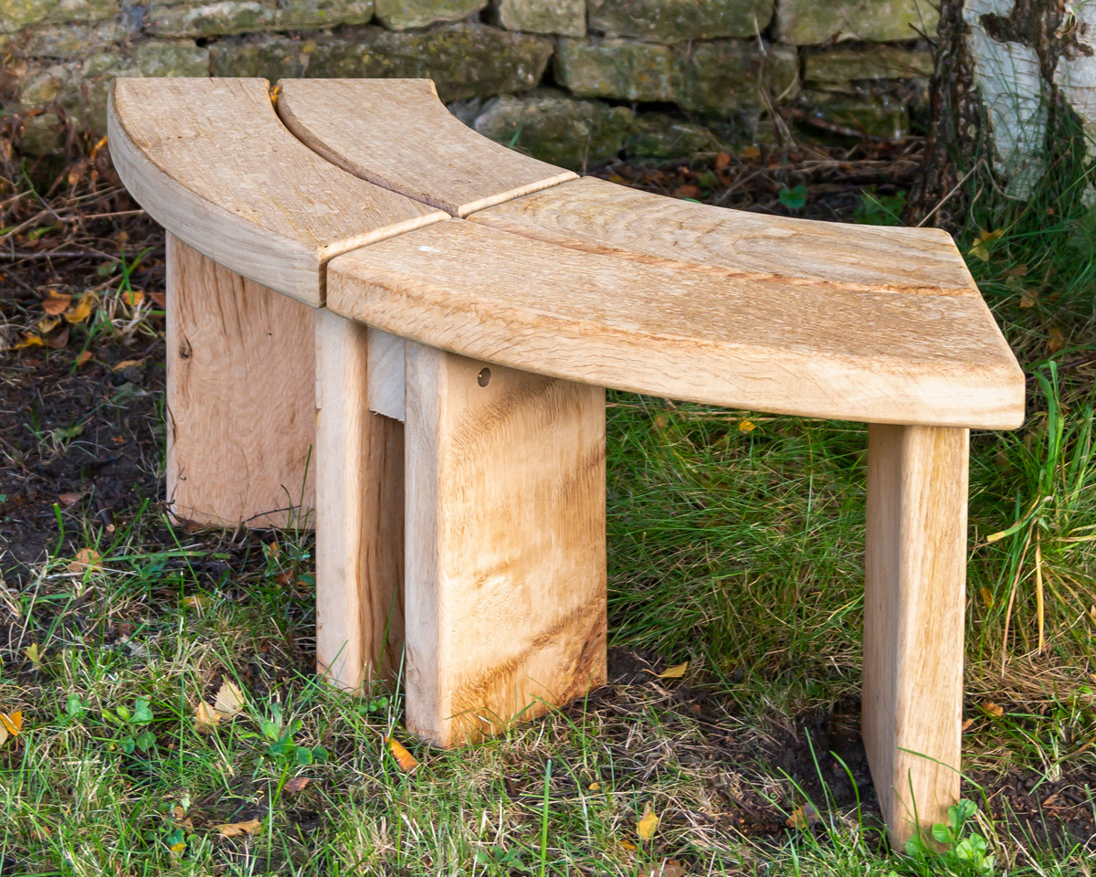 Curved oak bench contructed from two 45° segments.